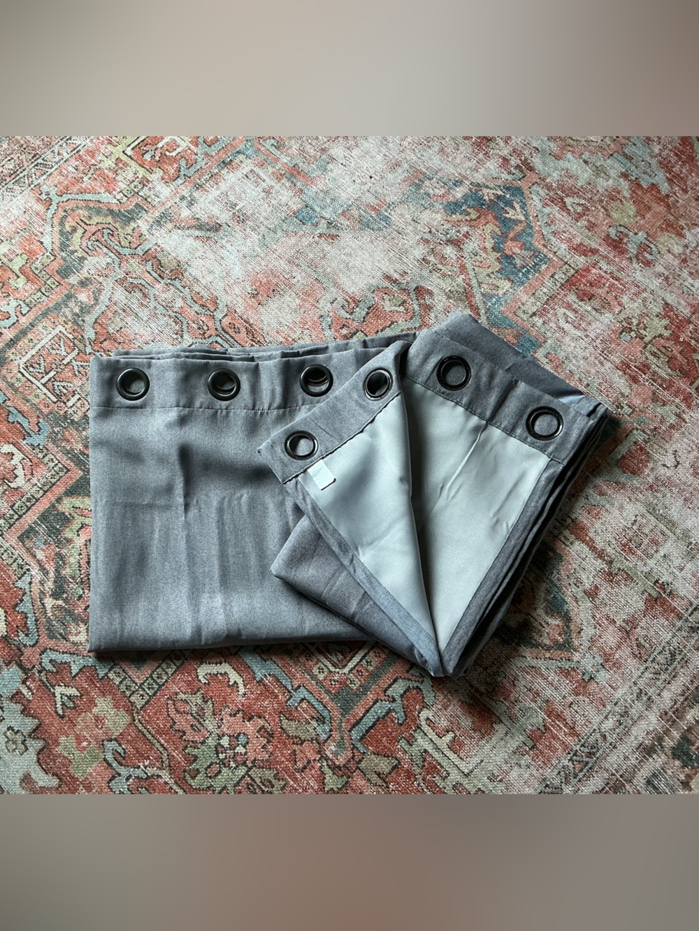Pair of gray lined curtain panels, 84x51